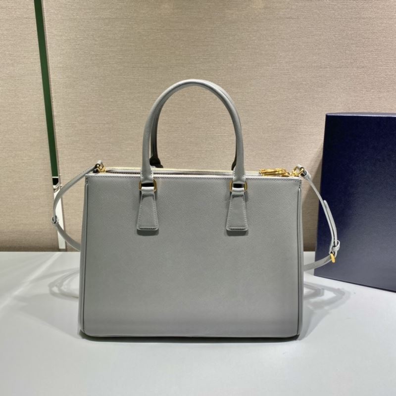 Pra*a top handle bags
